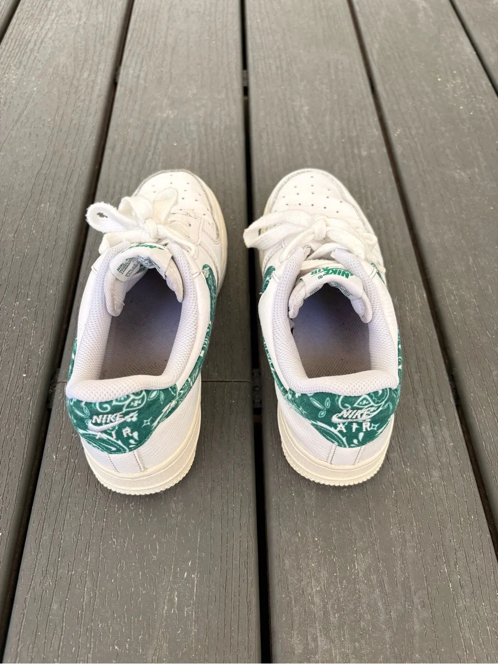 Nike Womens White Sneakers with Green Swoosh Accent